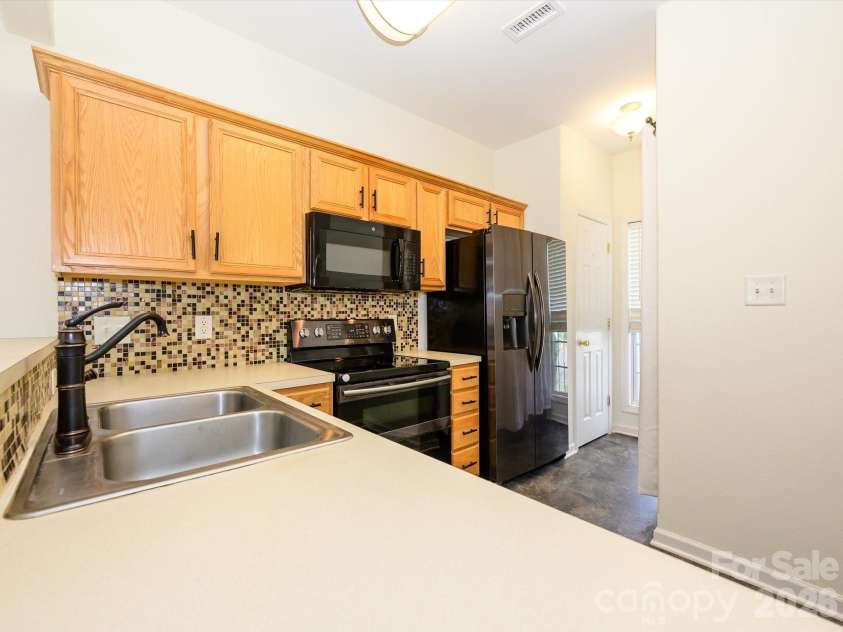 4055 Center Place Drive, Harrisburg, NC 28075.  MLS# CAR4367604, YatesRealty ID 15989. 