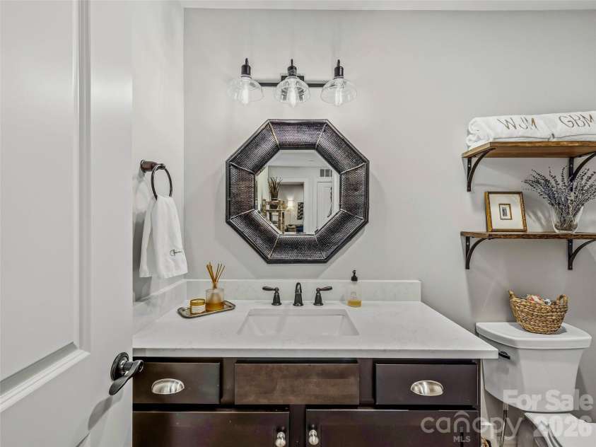 29 French Broad Street, Brevard, NC 28712.  MLS# CAR4231925, YatesRealty ID 15990. Half Bath