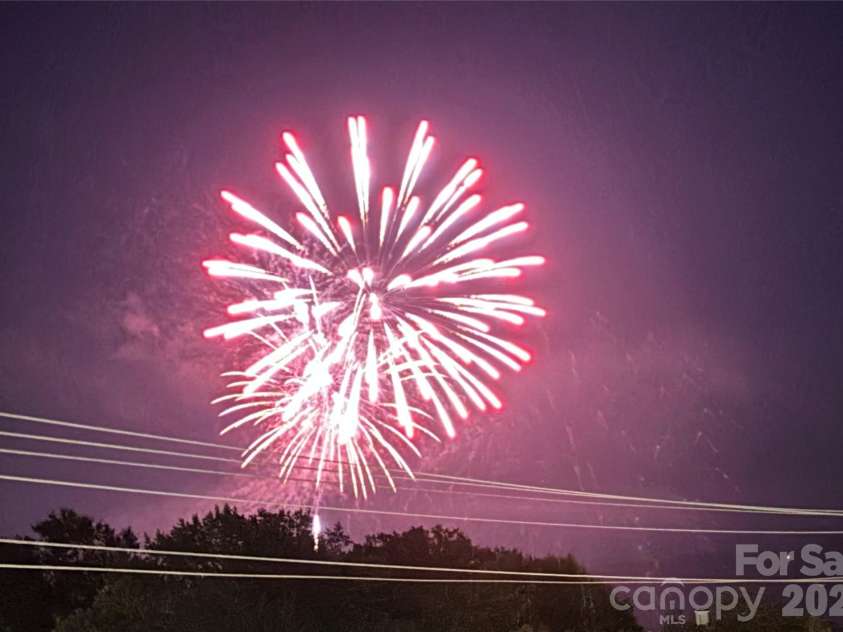 29 French Broad Street, Brevard, NC 28712.  MLS# CAR4231925, YatesRealty ID 15990. View from balcony, 7/4/26