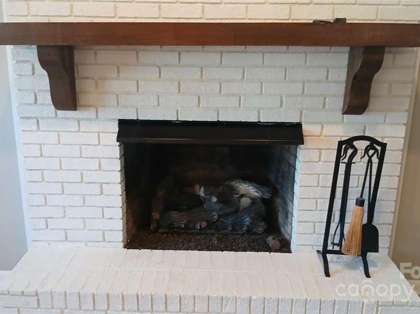 309 Rodoret Street, Valdese, NC 28690.  MLS# CAR4194557, YatesRealty ID 15993. Gas Log Fireplace