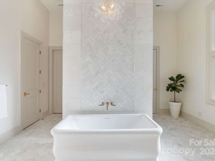 7679 Rabbit Circle, Denver, NC 28037.  MLS# CAR4248734, YatesRealty ID 15997. Soak in luxury...