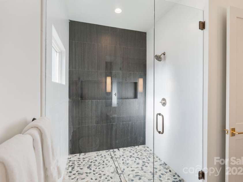 7679 Rabbit Circle, Denver, NC 28037.  MLS# CAR4248734, YatesRealty ID 15997. Tiled walk-in shower