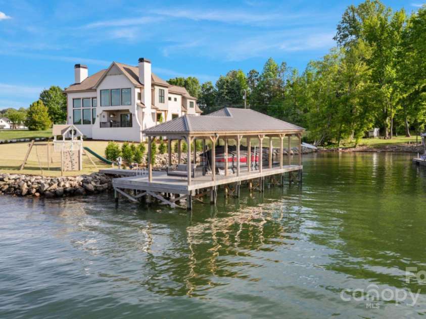 7679 Rabbit Circle, Denver, NC 28037.  MLS# CAR4248734, YatesRealty ID 15997. Trex covered dock with boat lift to experience everything Lake Life has to offer