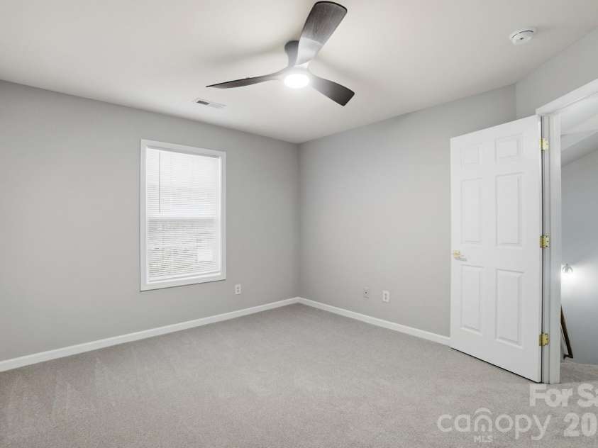 11284 Lions Mane Street, Charlotte, NC 28273.  MLS# CAR4331767, YatesRealty ID 1600. 2nd bedroom w/ ceiling fan