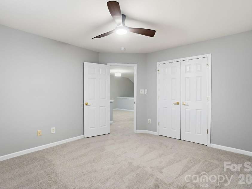 11284 Lions Mane Street, Charlotte, NC 28273.  MLS# CAR4331767, YatesRealty ID 1600. 2nd bedroom w/ large closet