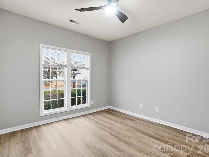 11284 Lions Mane Street, Charlotte, NC 28273.  MLS# CAR4331767, YatesRealty ID 1600. Ceiling fan in primary bedroom