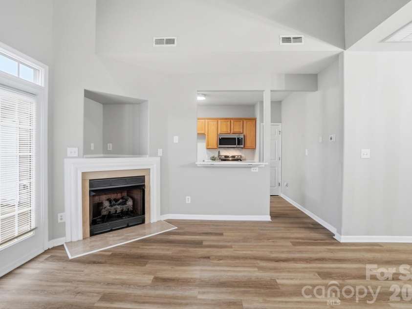 11284 Lions Mane Street, Charlotte, NC 28273.  MLS# CAR4331767, YatesRealty ID 1600. Kitchen open up to living area