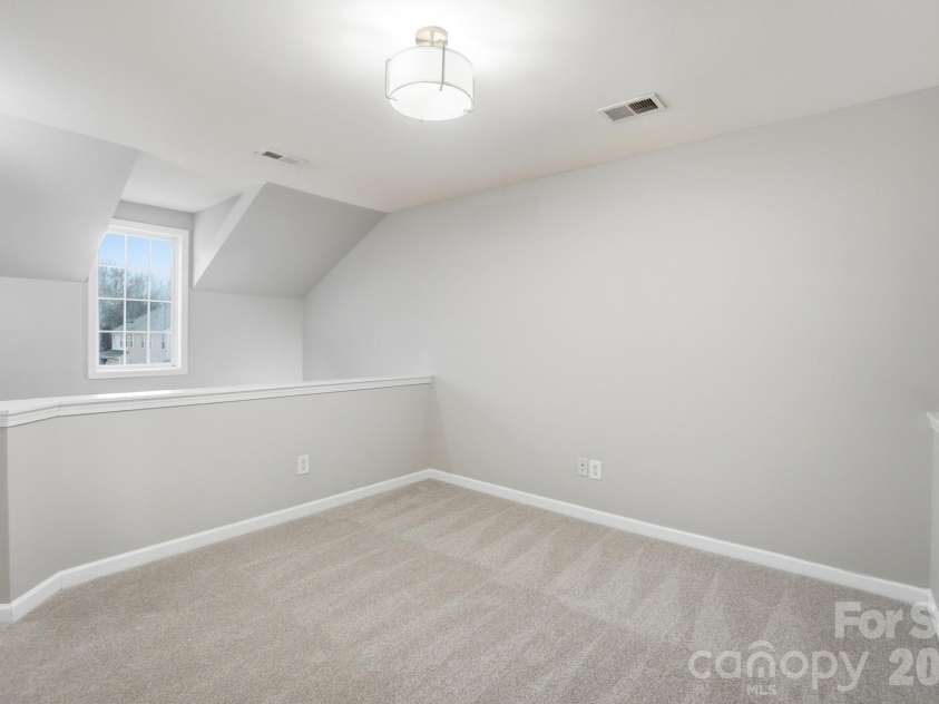 11284 Lions Mane Street, Charlotte, NC 28273.  MLS# CAR4331767, YatesRealty ID 1600. Loft has good natural light