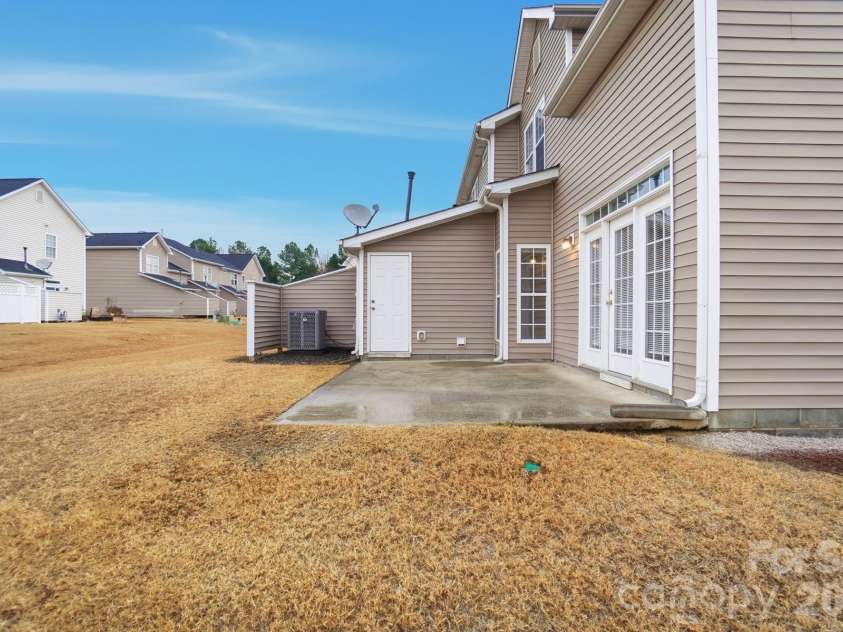 11284 Lions Mane Street, Charlotte, NC 28273.  MLS# CAR4331767, YatesRealty ID 1600. Storage closet off back patio