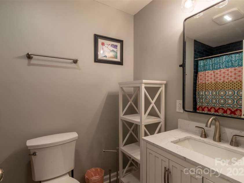 136 Dars Lane, Tuckasegee, NC 28783.  MLS# CAR4248083, YatesRealty ID 1600. Guest bath