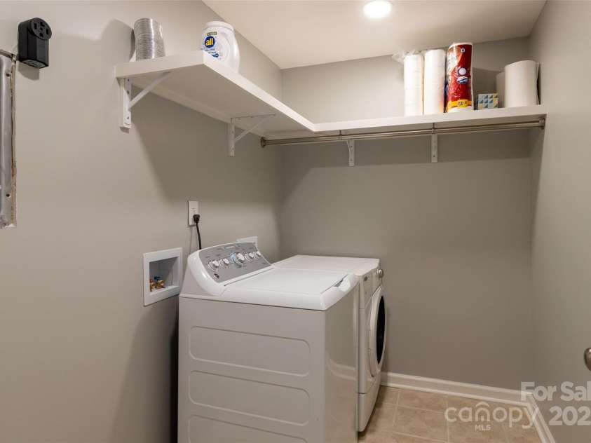 136 Dars Lane, Tuckasegee, NC 28783.  MLS# CAR4248083, YatesRealty ID 1600. Laundry Room Basement