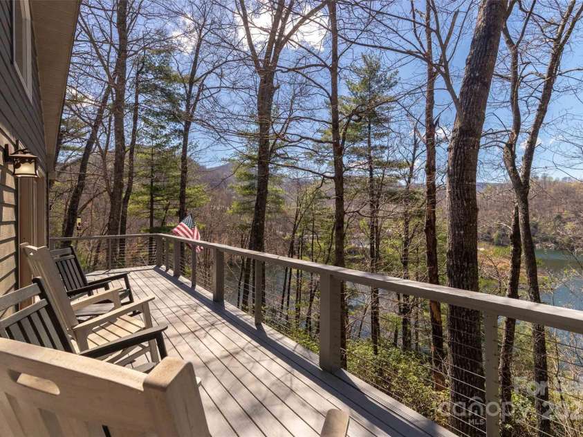 136 Dars Lane, Tuckasegee, NC 28783.  MLS# CAR4248083, YatesRealty ID 1600. Main Level Deck
