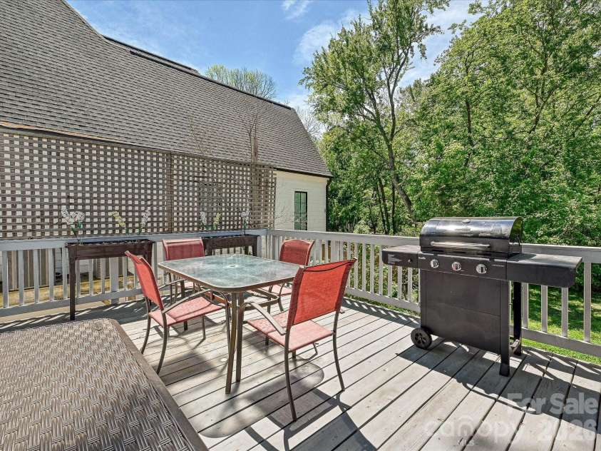3016 Hanson Drive, Charlotte, NC 28207.  MLS# CAR4369911, YatesRealty ID 16002. Deck off screen porch 