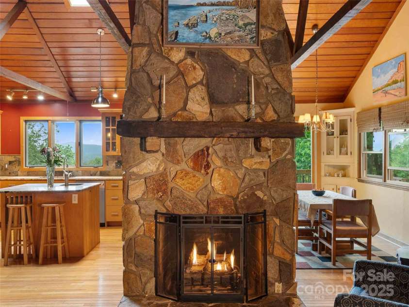 151 Heatherly Heights Road, Saluda, NC 28773.  MLS# CAR4257112, YatesRealty ID 16014. A warm stone fireplace