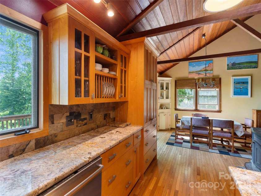 151 Heatherly Heights Road, Saluda, NC 28773.  MLS# CAR4257112, YatesRealty ID 16014. Cathedral ceiling enhances the mountain views