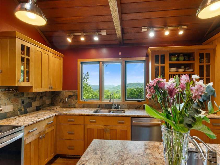 151 Heatherly Heights Road, Saluda, NC 28773.  MLS# CAR4257112, YatesRealty ID 16014. Views from the stunning kitchen