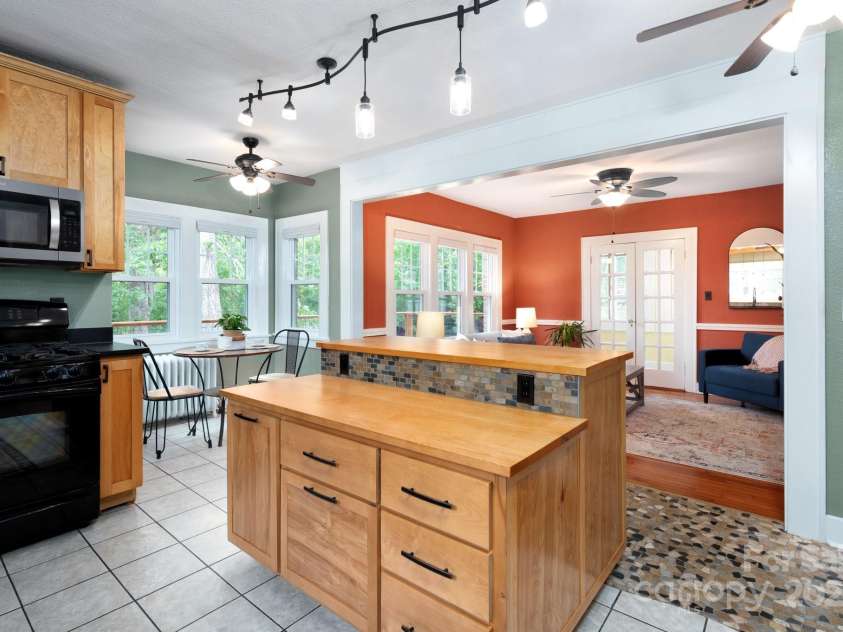 135 Tacoma Circle, Asheville, NC 28801.  MLS# CAR4259347, YatesRealty ID 16015. Kitchen Island with Custom-Wood Counter