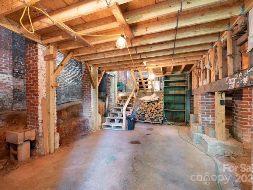 135 Tacoma Circle, Asheville, NC 28801.  MLS# CAR4259347, YatesRealty ID 16015. Lower Level In Basement