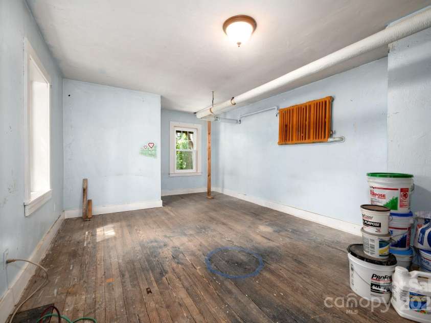 135 Tacoma Circle, Asheville, NC 28801.  MLS# CAR4259347, YatesRealty ID 16015. Potential Bedroom In Basement (currently unfinished)