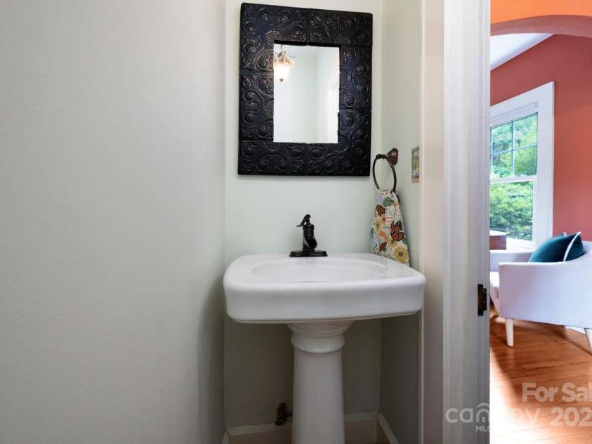 135 Tacoma Circle, Asheville, NC 28801.  MLS# CAR4259347, YatesRealty ID 16015. Powder Room On Main Level