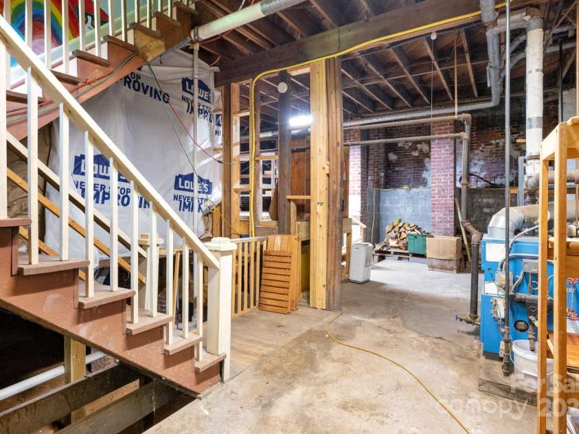 135 Tacoma Circle, Asheville, NC 28801.  MLS# CAR4259347, YatesRealty ID 16015. Two-Story Basement Offers Many Possibilities