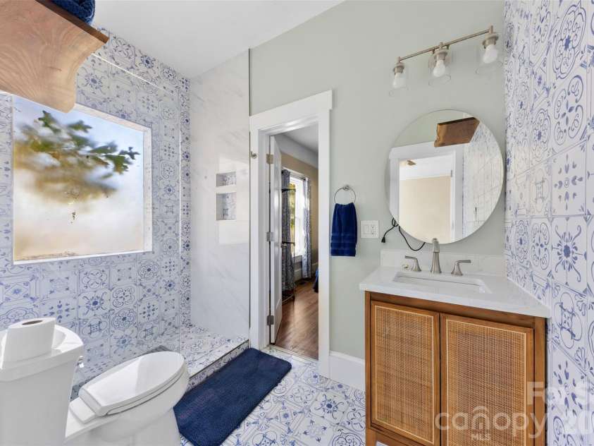 604 Pearl Avenue, Kannapolis, NC 28083.  MLS# CAR4374176, YatesRealty ID 16018. Adjoining Bathroom