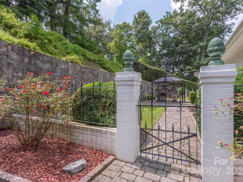 568 Country Club Drive, Waynesville, NC 28786.  MLS# CAR4166222, YatesRealty ID 16019. Gated entrance to private back yard.