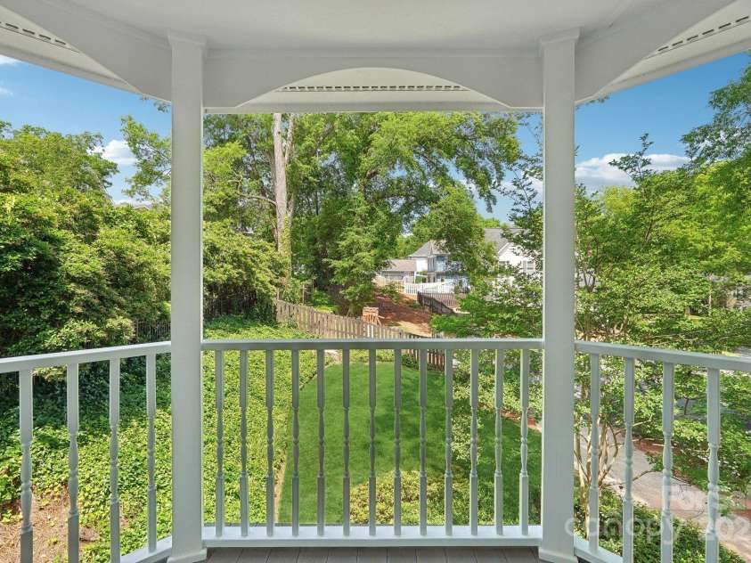 545 Dilworth Mews Court, Charlotte, NC 28203.  MLS# CAR4237335, YatesRealty ID 16023. Lovely owner's balcony.  Private and serene