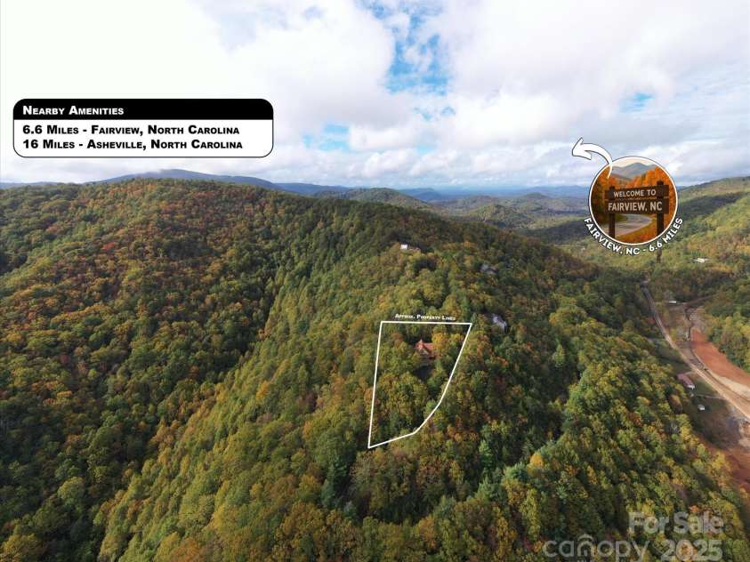 94 Davey Crockett Road, Fairview, NC 28730.  MLS# CAR4310188, YatesRealty ID 1603. Aerial Image - Nestled in the Mountains!