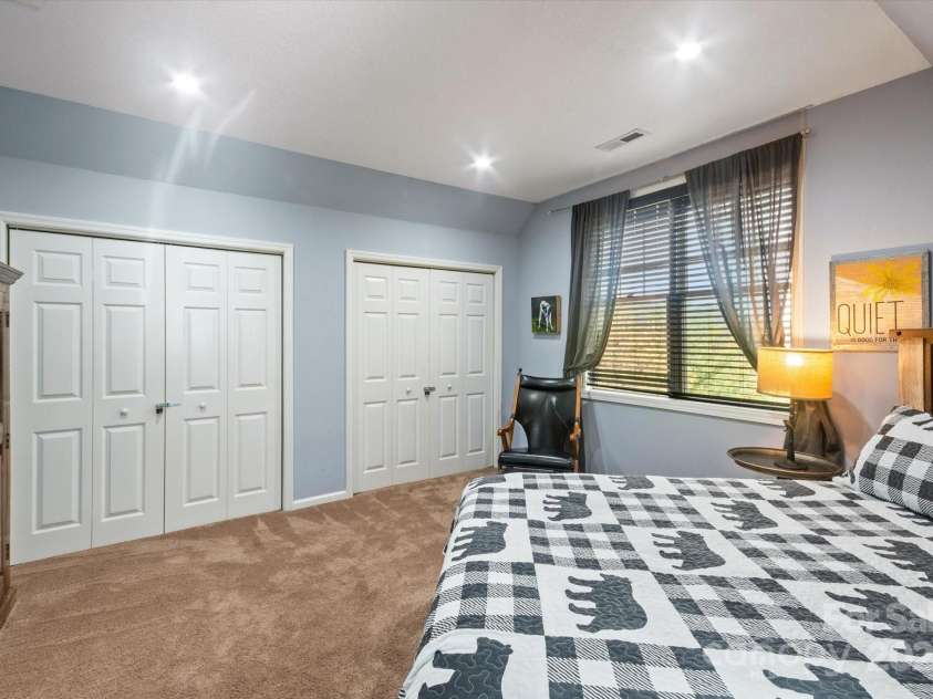 94 Davey Crockett Road, Fairview, NC 28730.  MLS# CAR4310188, YatesRealty ID 1603. Bedroom 2 - double closets!