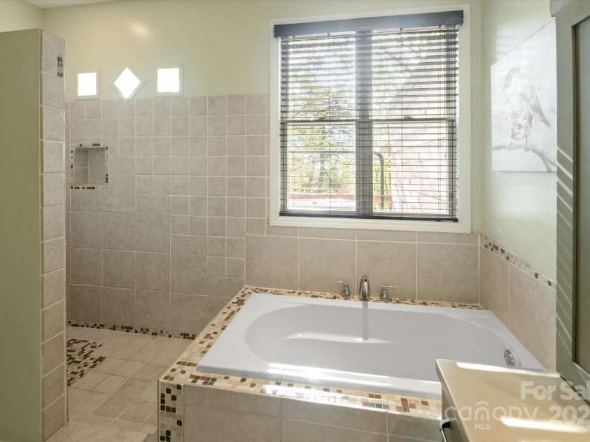 94 Davey Crockett Road, Fairview, NC 28730.  MLS# CAR4310188, YatesRealty ID 1603. Primary Bathroom