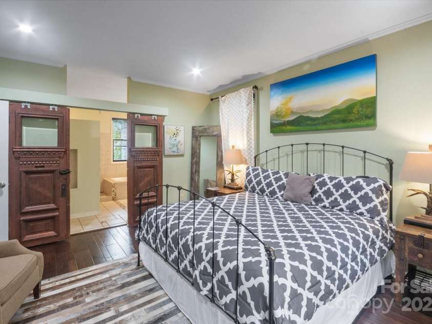 94 Davey Crockett Road, Fairview, NC 28730.  MLS# CAR4310188, YatesRealty ID 1603. Primary Bedroom