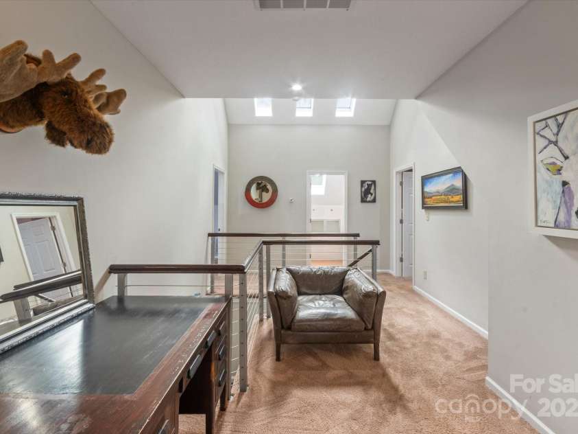 94 Davey Crockett Road, Fairview, NC 28730.  MLS# CAR4310188, YatesRealty ID 1603. Upstairs Loft/Family Room