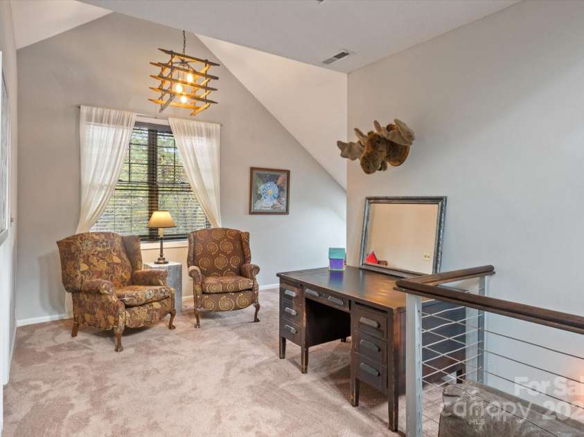 94 Davey Crockett Road, Fairview, NC 28730.  MLS# CAR4310188, YatesRealty ID 1603. Upstairs Loft/Family Room
