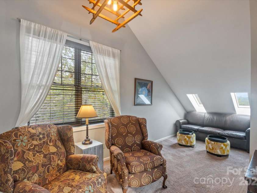 94 Davey Crockett Road, Fairview, NC 28730.  MLS# CAR4310188, YatesRealty ID 1603. Upstairs Loft/Family Room