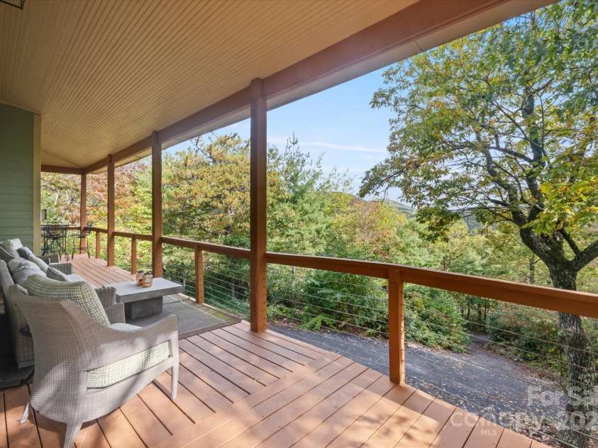 94 Davey Crockett Road, Fairview, NC 28730.  MLS# CAR4310188, YatesRealty ID 1603. Wraparound Deck - Amazing Views!