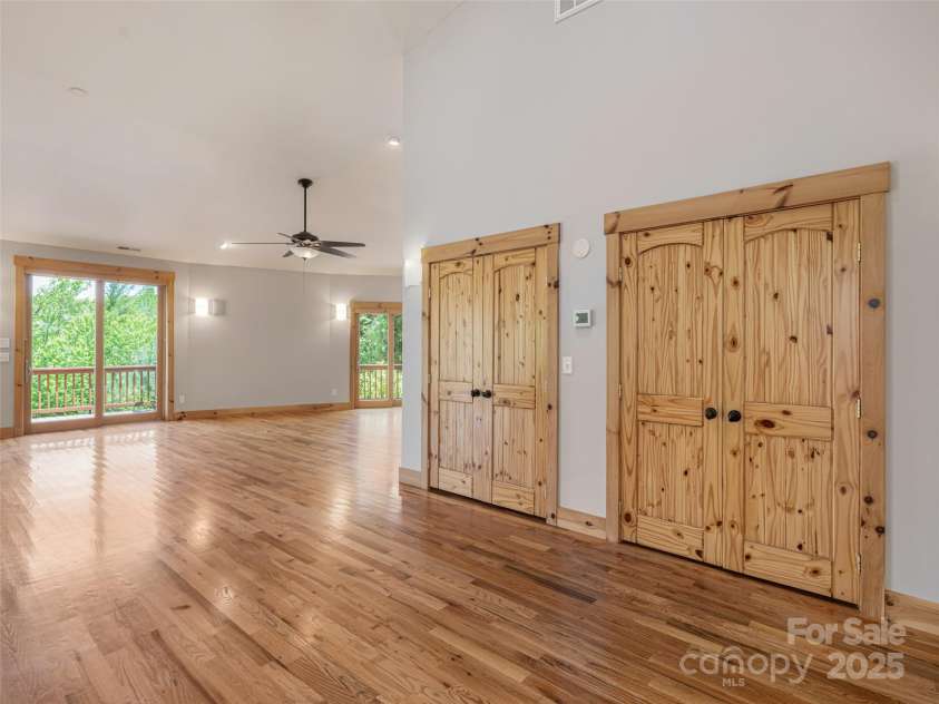 15 Sassy Lane, Asheville, NC 28805.  MLS# CAR4248835, YatesRealty ID 16032. Dual Storage closet off Great Room made of pine