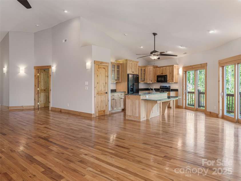 15 Sassy Lane, Asheville, NC 28805.  MLS# CAR4248835, YatesRealty ID 16032. Freshly painted interior walls throughout house. Kitchen opens to Great Room, Sitting Area and Foyer... All with oak flooring creating a seamless design