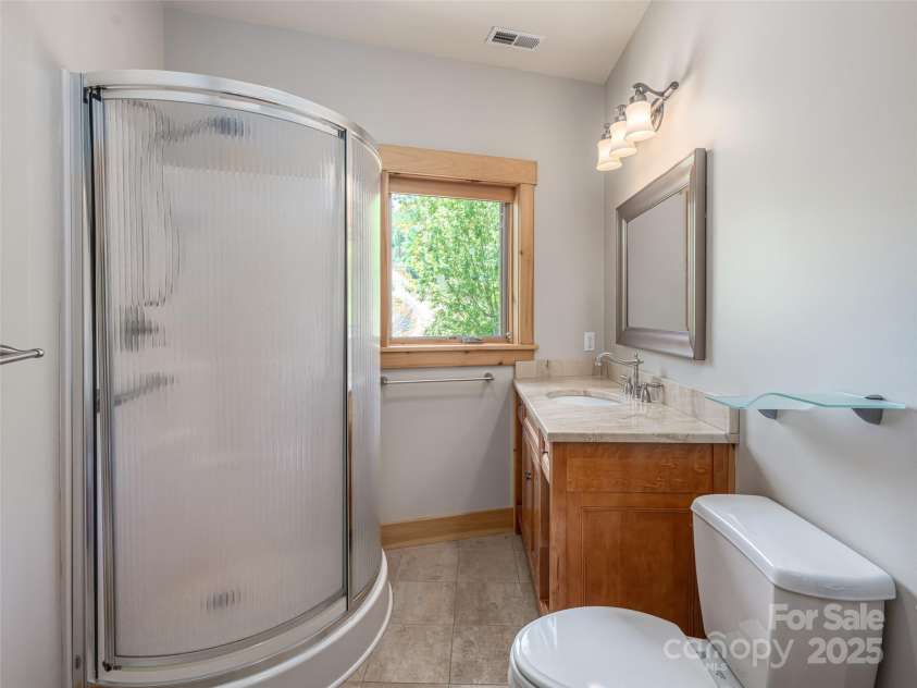 15 Sassy Lane, Asheville, NC 28805.  MLS# CAR4248835, YatesRealty ID 16032. Guest/ Second full bath with walk in shower. 