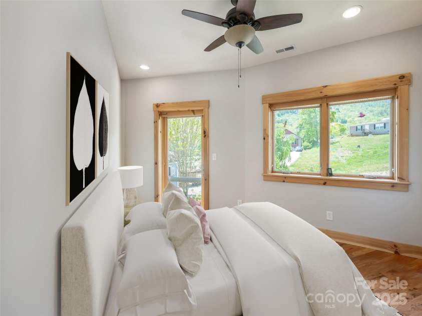 15 Sassy Lane, Asheville, NC 28805.  MLS# CAR4248835, YatesRealty ID 16032. Virtually staged third bedroom complete with exit/entry door.  Works well as an office, nursery, playroom or library.