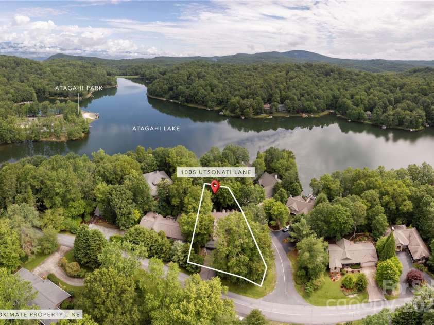 1005 Utsonati Lane, Brevard, NC 28712.  MLS# CAR4246828, YatesRealty ID 16033. Lake Life