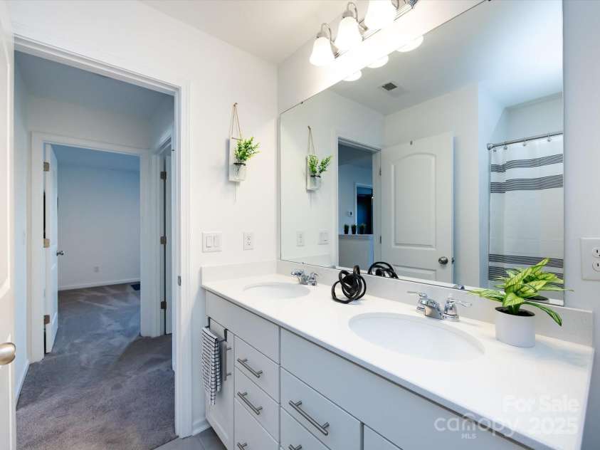 8903 Ansley Park Place, Huntersville, NC 28078.  MLS# CAR4311393, YatesRealty ID 16036. Full Bath with dual vanity & tub/shower!