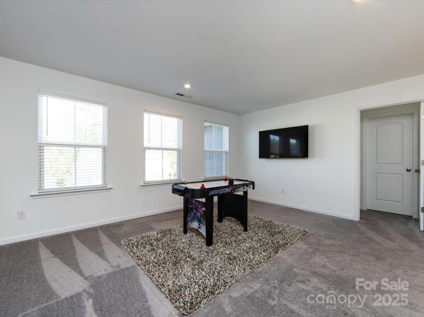 8903 Ansley Park Place, Huntersville, NC 28078.  MLS# CAR4311393, YatesRealty ID 16036. Loft Area has so many possibilities/uses from game room to casual, comfortable sitting/living area! 