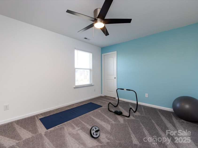 8903 Ansley Park Place, Huntersville, NC 28078.  MLS# CAR4311393, YatesRealty ID 16036. Spacious Bedroom 4 on upper level with ceiling fan/light!