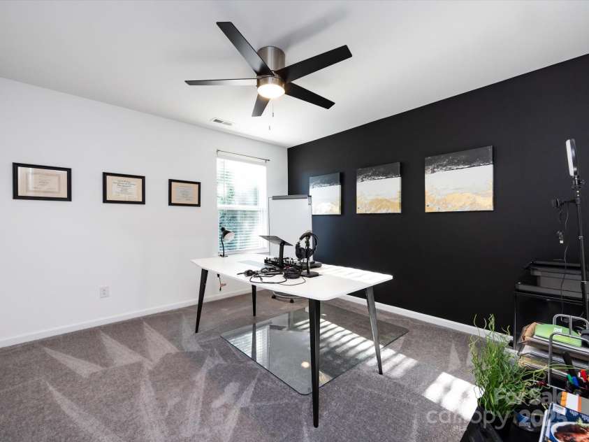 8903 Ansley Park Place, Huntersville, NC 28078.  MLS# CAR4311393, YatesRealty ID 16036. Spacious Bedroom 5 on upper level with ceiling fan/light!