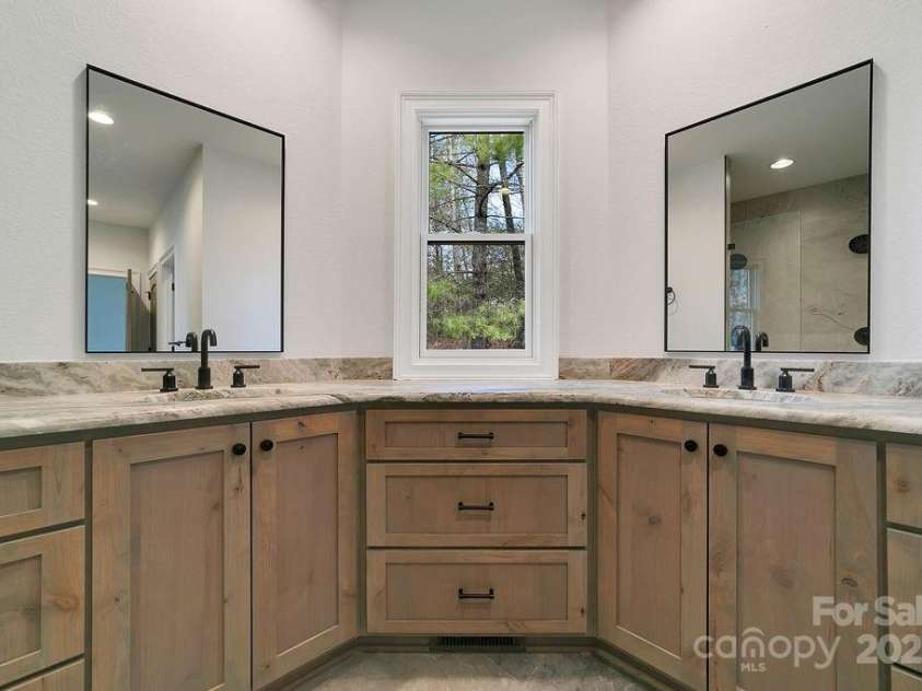 5039 Connestee Trail, Brevard, NC 28712.  MLS# CAR4216573, YatesRealty ID 1604. Double Vanity