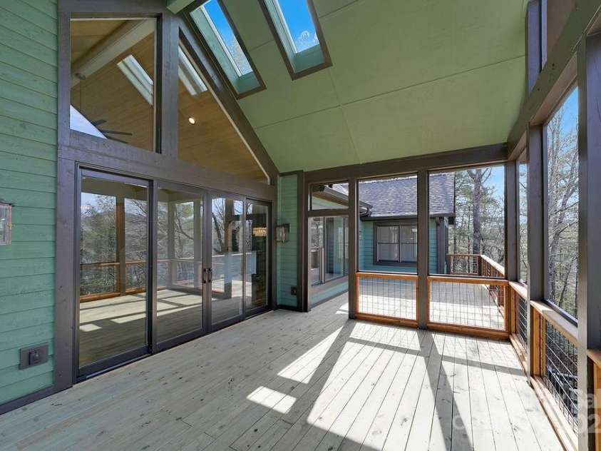 5039 Connestee Trail, Brevard, NC 28712.  MLS# CAR4216573, YatesRealty ID 1604. Enjoy Beautiful Sunsets