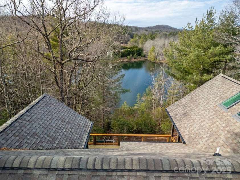 5039 Connestee Trail, Brevard, NC 28712.  MLS# CAR4216573, YatesRealty ID 1604. Lake and Mountain View