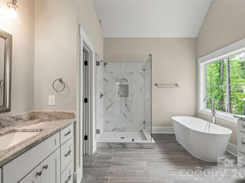 156 Clear Springs Road, Mooresville, NC 28115.  MLS# CAR4324685, YatesRealty ID 16041. Master bath with vaulted ceiling