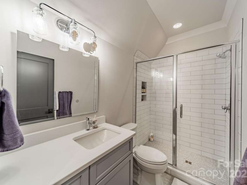 14228 Ryker Way, Davidson, NC 28036.  MLS# CAR4257385, YatesRealty ID 16043. En Suite bathroom for bedroom one.